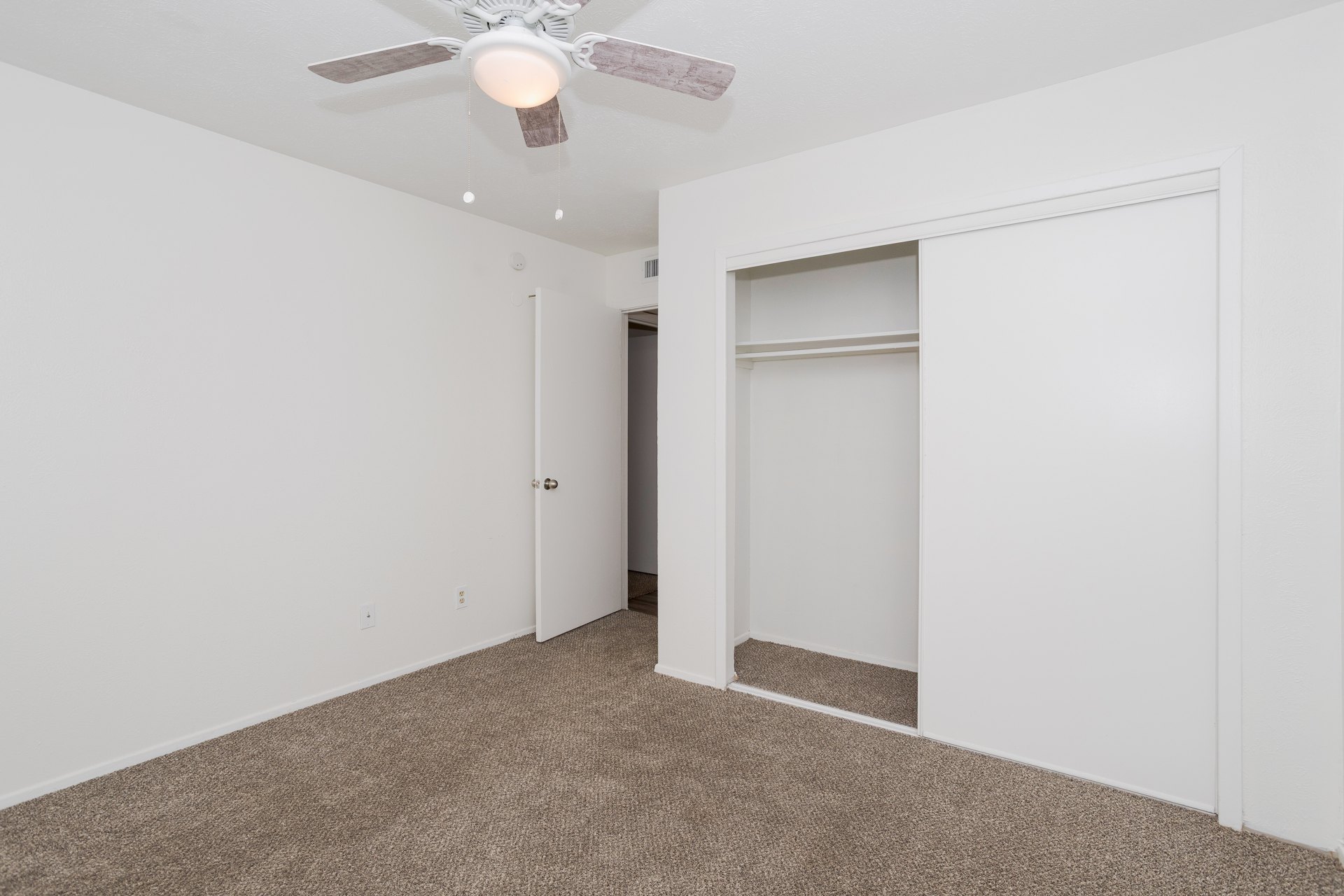 Apartment bedroom with spacious closet at Josey Place